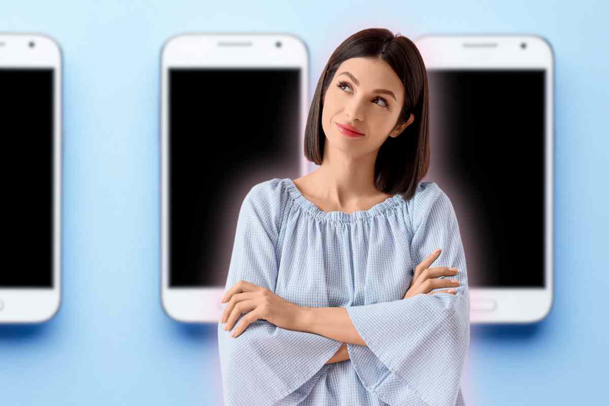 donna che pensa ai cellulari